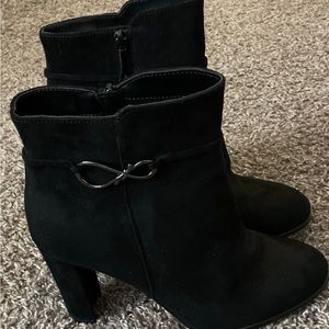 Impo high heeled boots.